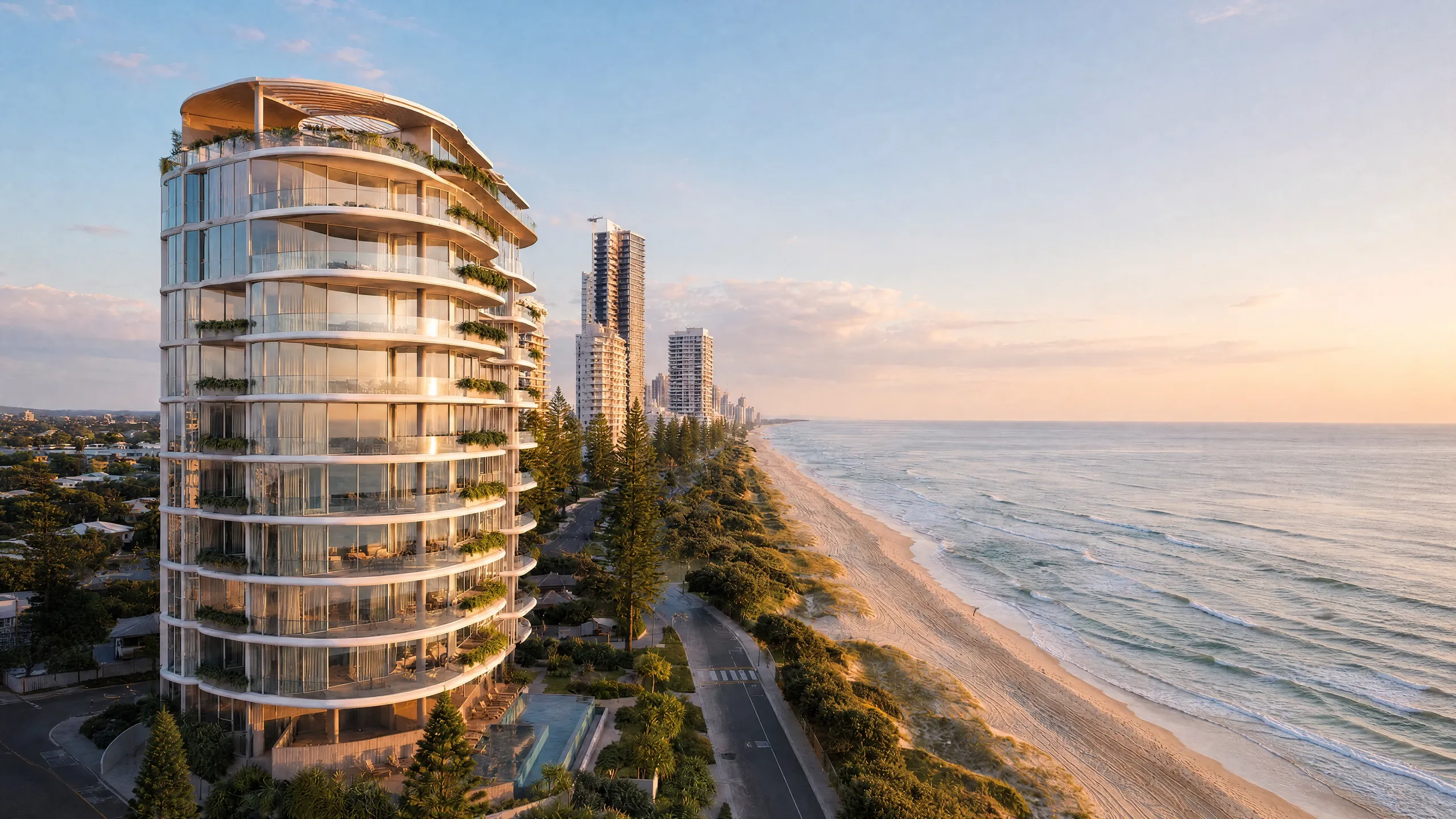 Coastal apartment tower at morning, sun rising over the ocean
