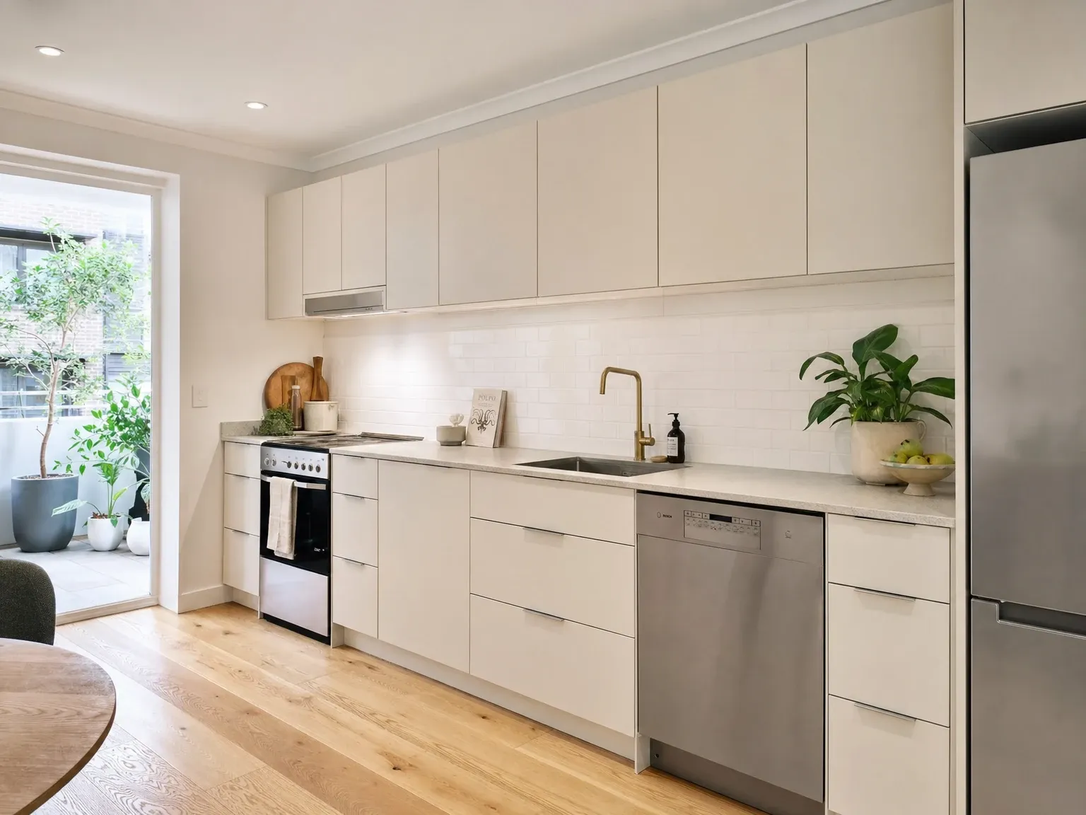 The same apartment kitchen after an IKEA METOD fit-out
