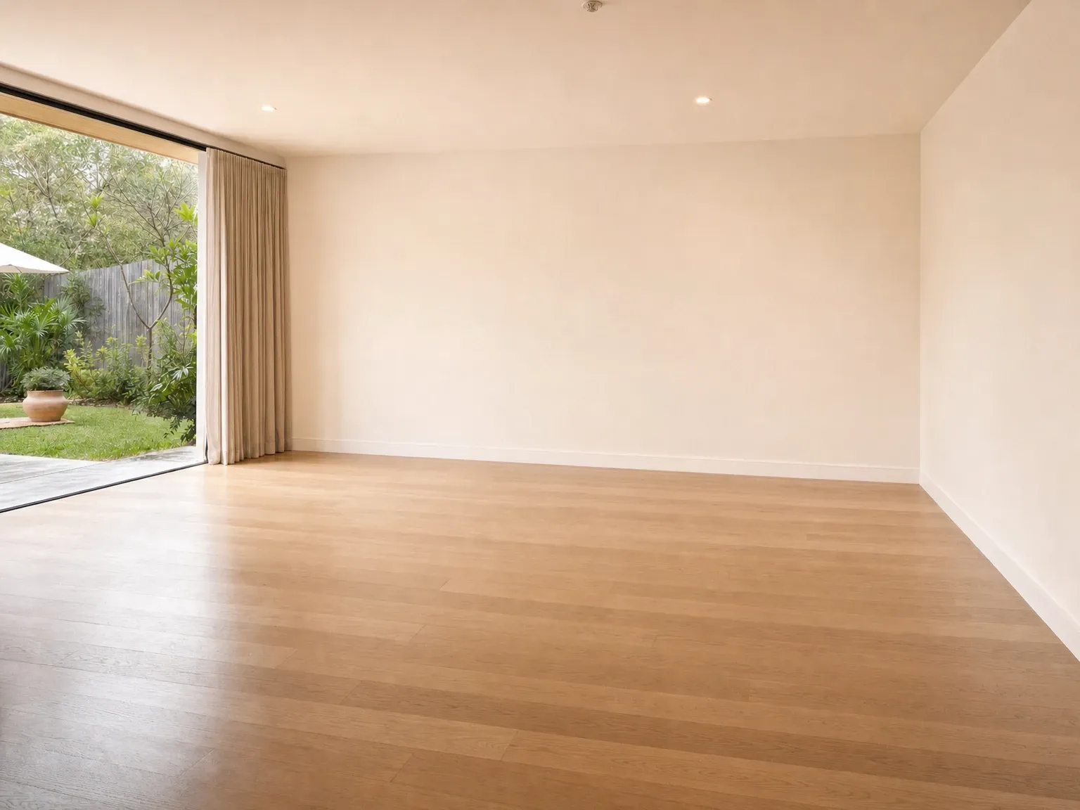 Empty Australian living room before a modern boho fit-out