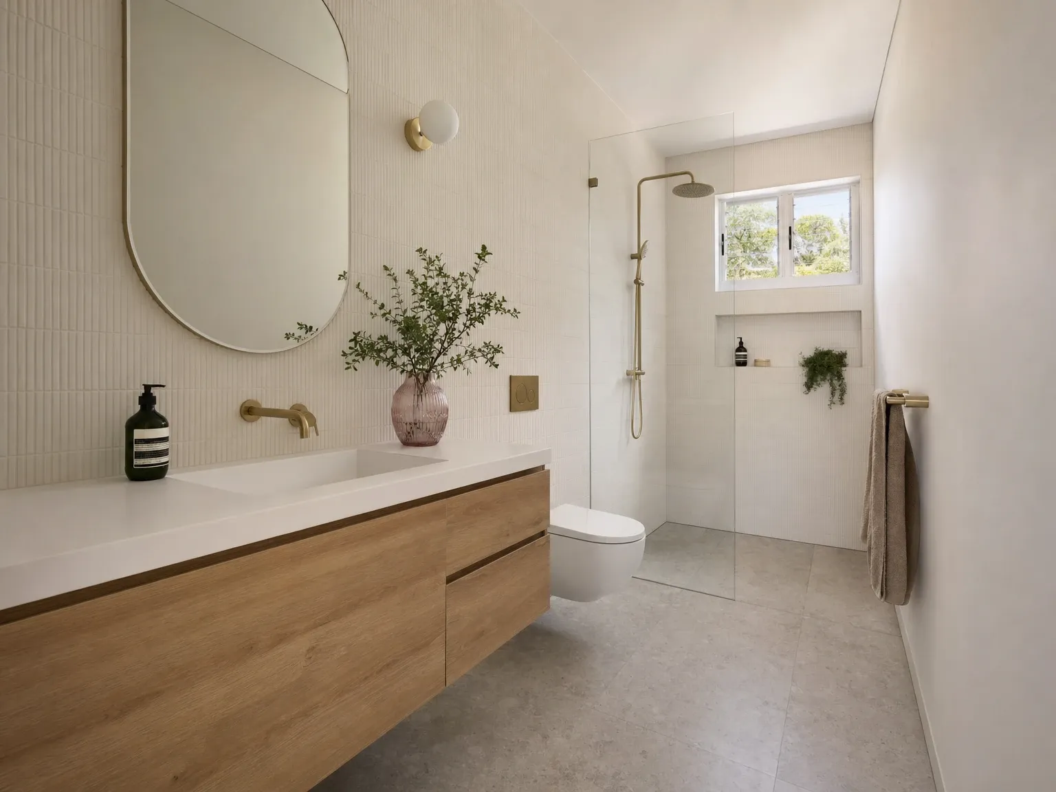 The same bathroom after a layout-aware renovation with resolved clearances and finishes