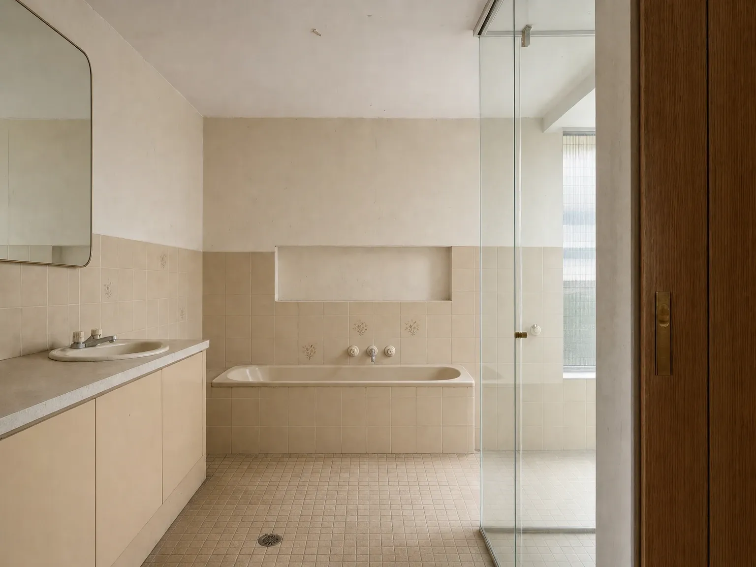 Dated 1990s-style bathroom before renovation