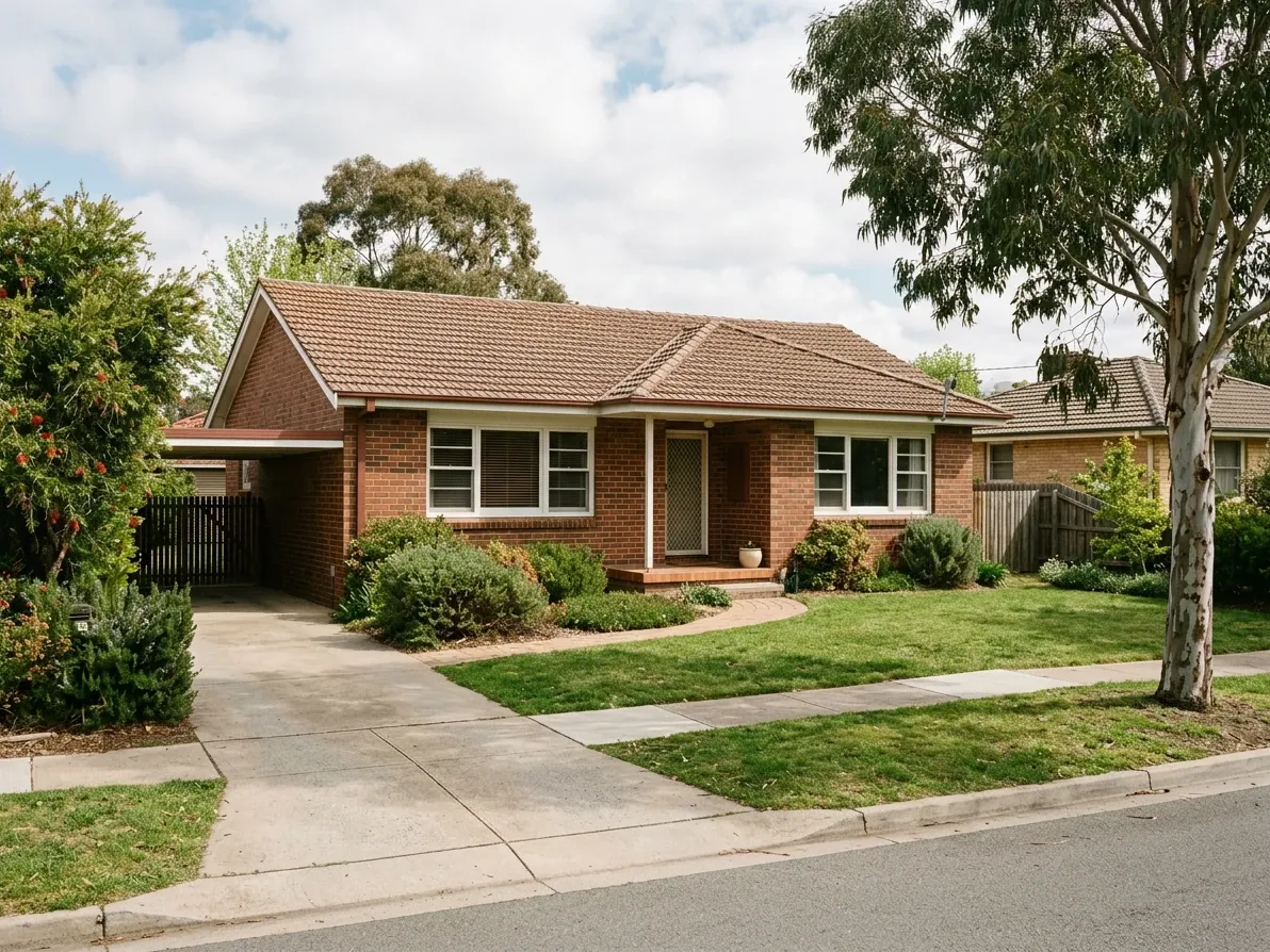 Modest 1960s Australian brick-veneer family home on a quiet suburban street