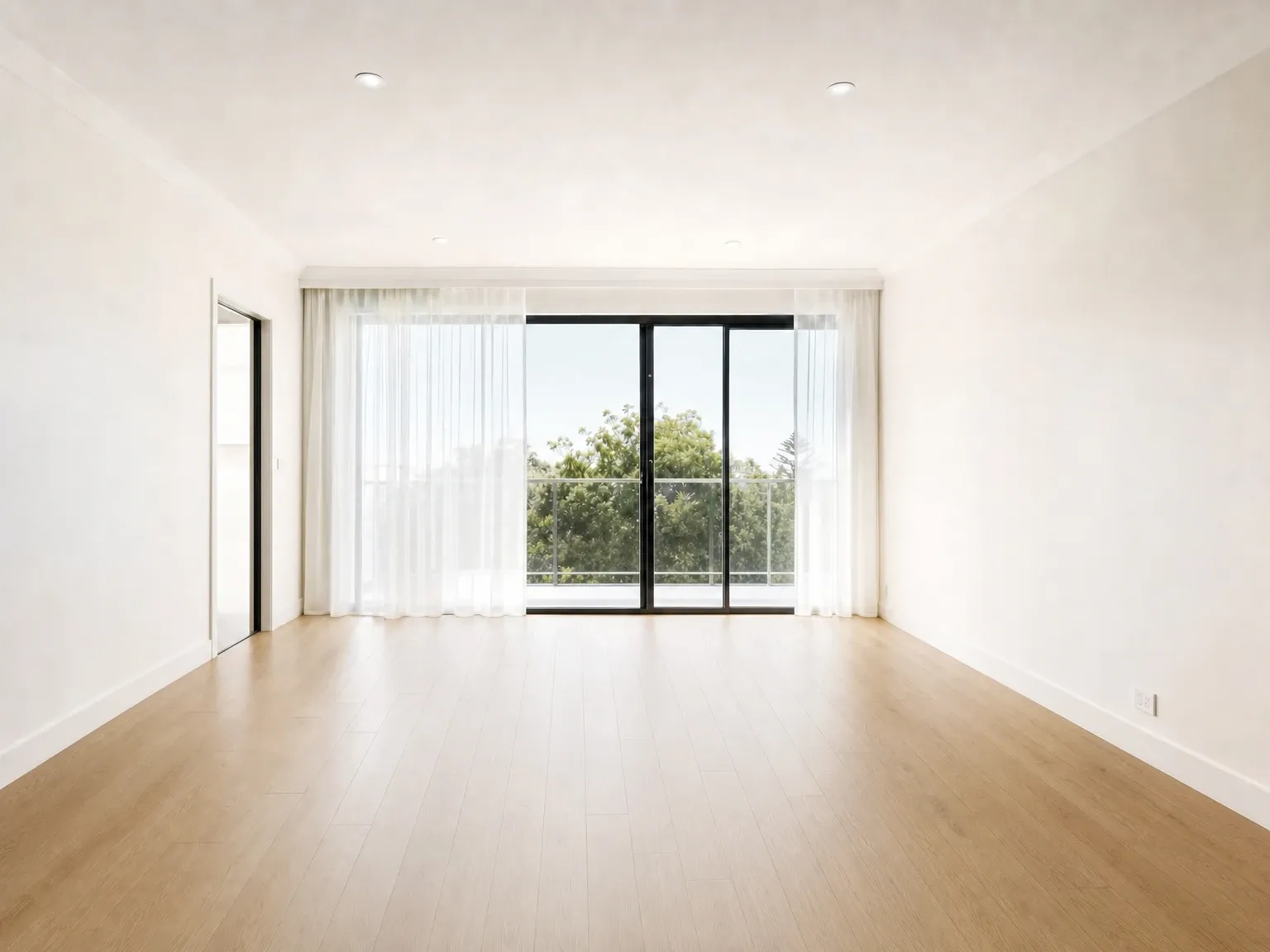 Empty Australian living room with bare floors and no furniture before virtual staging