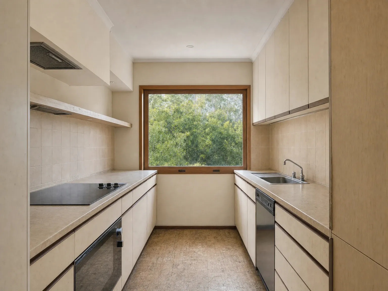 Dated galley kitchen before an IKEA flat-pack renovation
