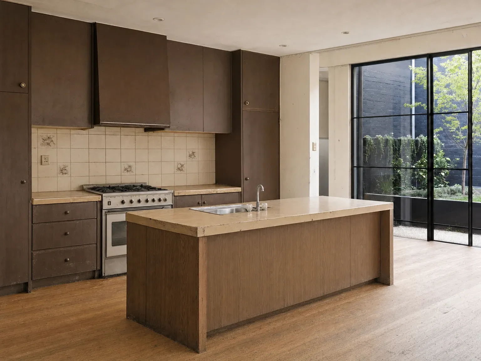 Dated Australian kitchen before an industrial-style renovation
