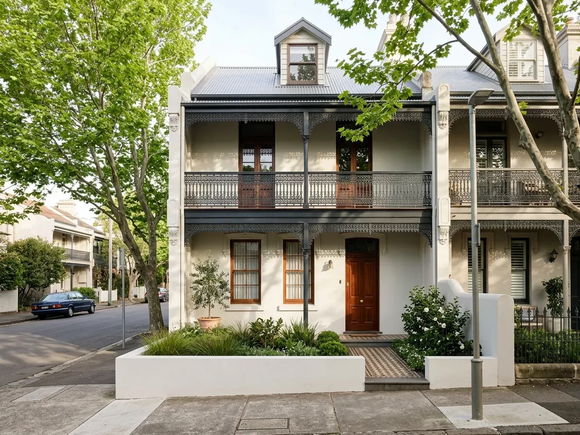 Restored inner-Sydney Victorian terrace facade on a leafy street