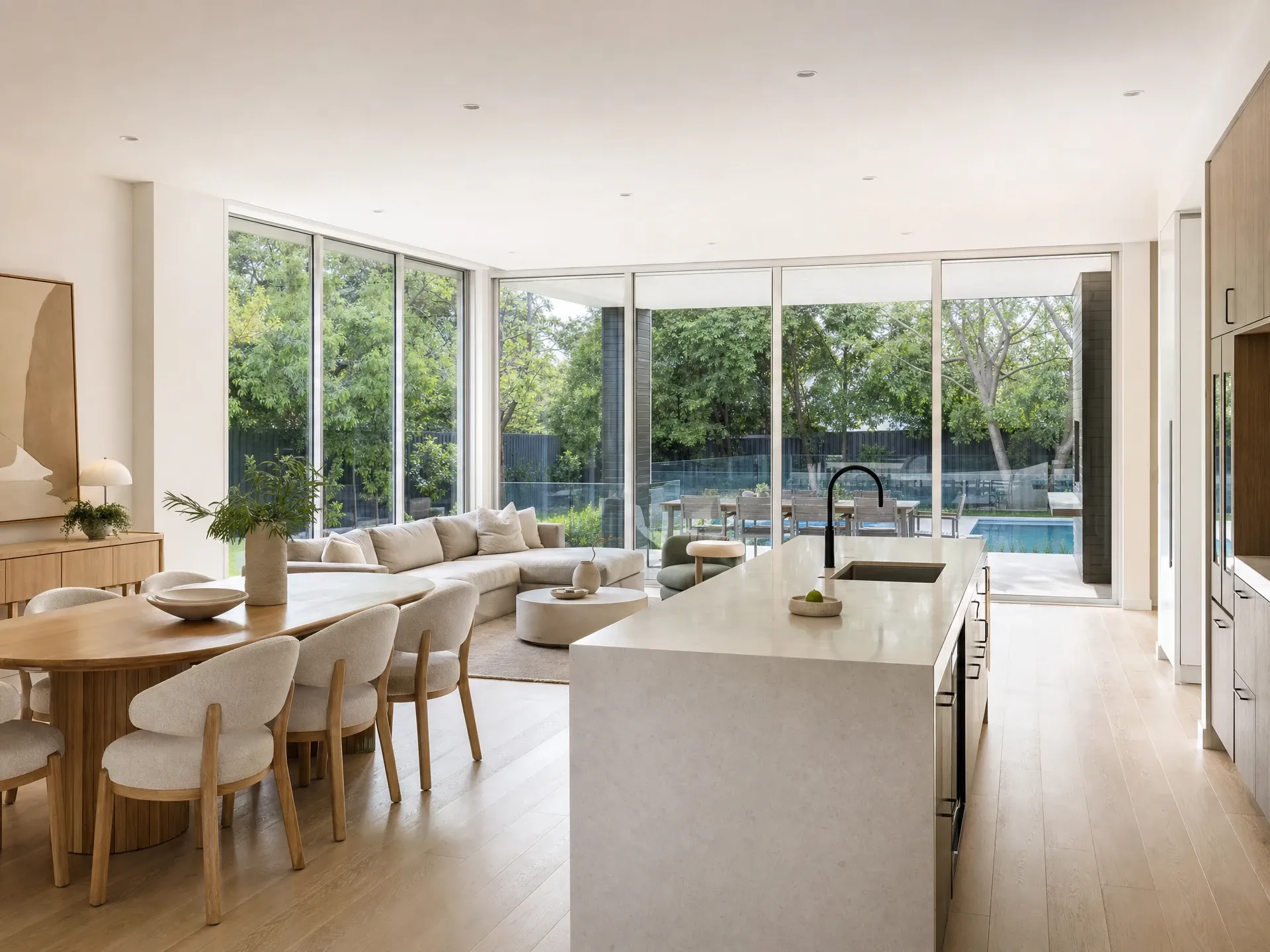 Professionally edited open-plan Australian home interior with straight verticals, neutral white balance and held window views