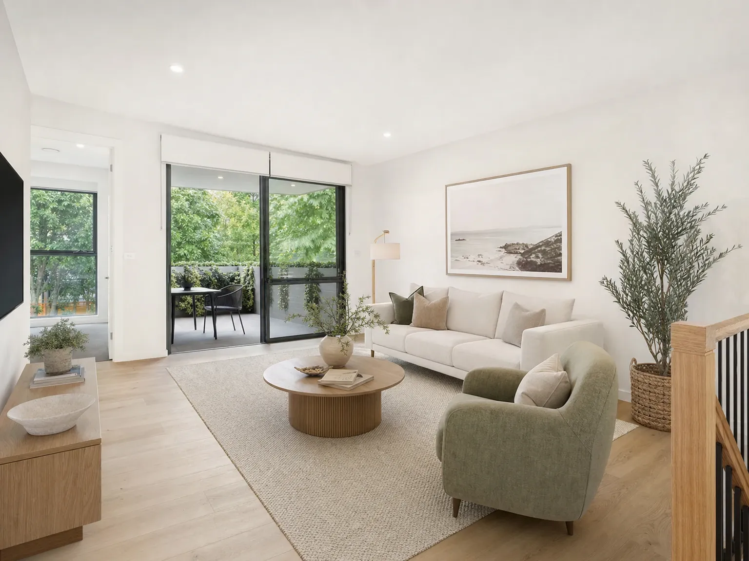 The same living room after virtual decluttering and neutral buyer-friendly re-staging