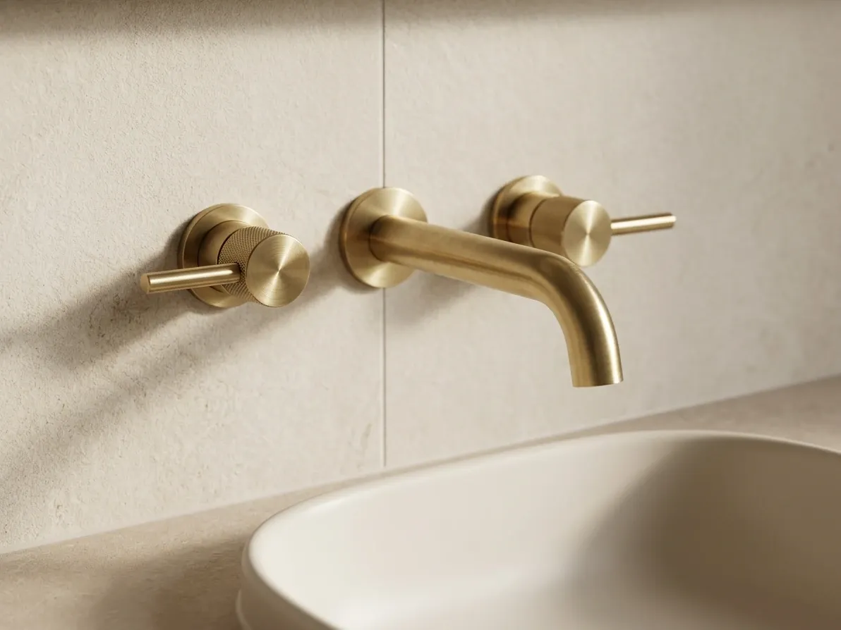 Wall-mounted bathroom tapware above a porcelain vanity top